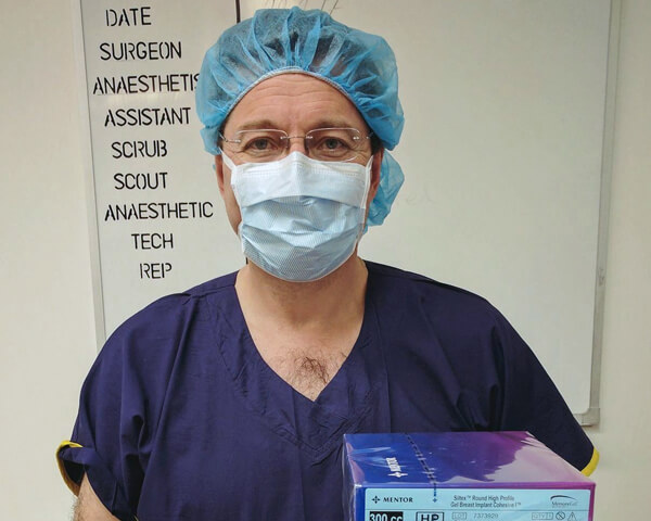 Dr Craig Rubinstein Specialist Plastic Surgeon Breast Tummy Surgery Blue Scrub